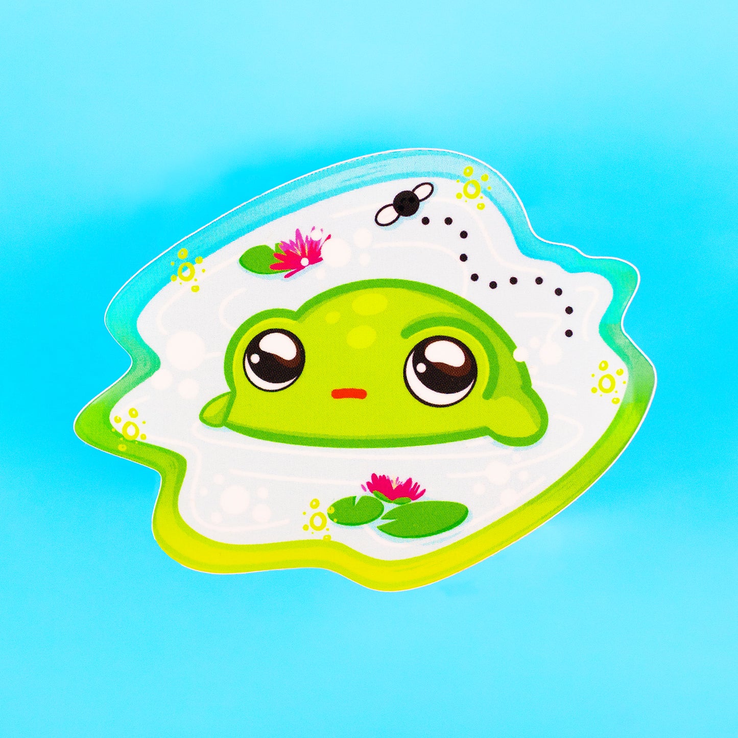 kawaii frog sticker on blue background